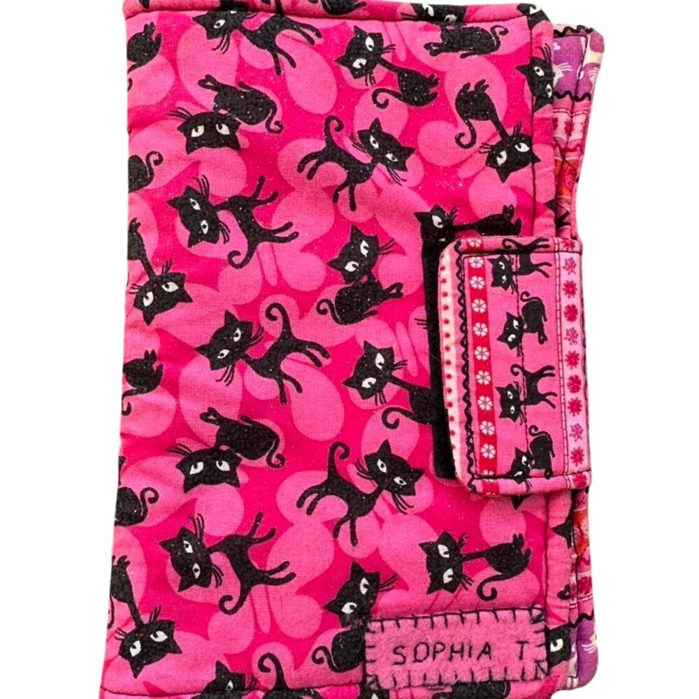 Pink and black cat book cover with‎ a cute design